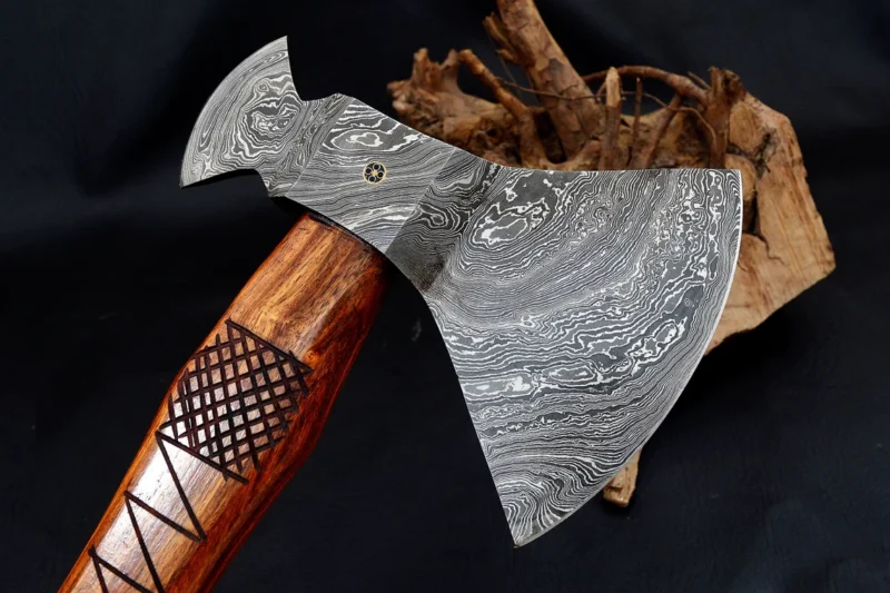 Custom-made Viking axe with a unique Damascus steel blade and solid wooden handle. Perfect for collectors, reenactors, or as a functional outdoor tool.